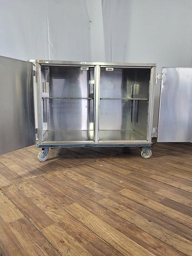 Used STAINLESS STEEL CASE CART WITH TWO DOORS AND WIRE SHELF !