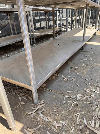 Used 12 FT STAINLESS STEEL TABLE WITH UNDERSHELF