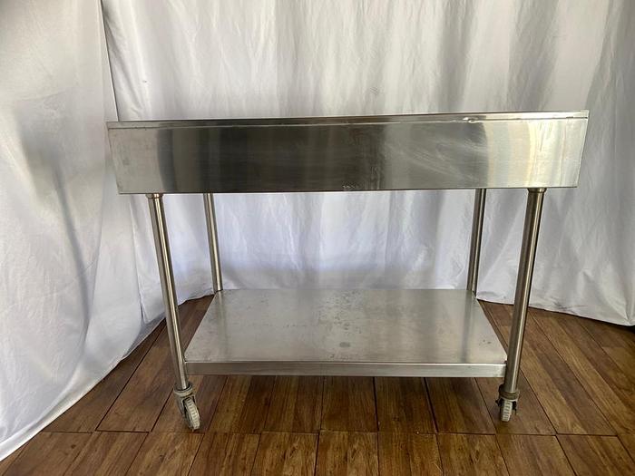 Used 4FT STAINLESS STEEL ROLLING PREP TABLE !