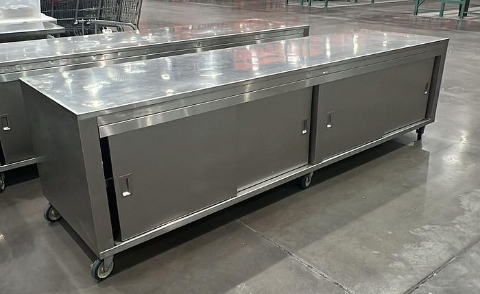 Used STAINLESS STEEL TABLE WITH SLIDING DOORS