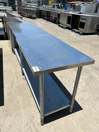 Used 8 FT STAINLESS STEEL WORK TABLE WITH UNDERSHELF./