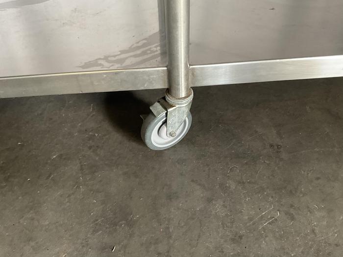 Used 72" COMMERCIAL TALBLE WITH CASTERS !
