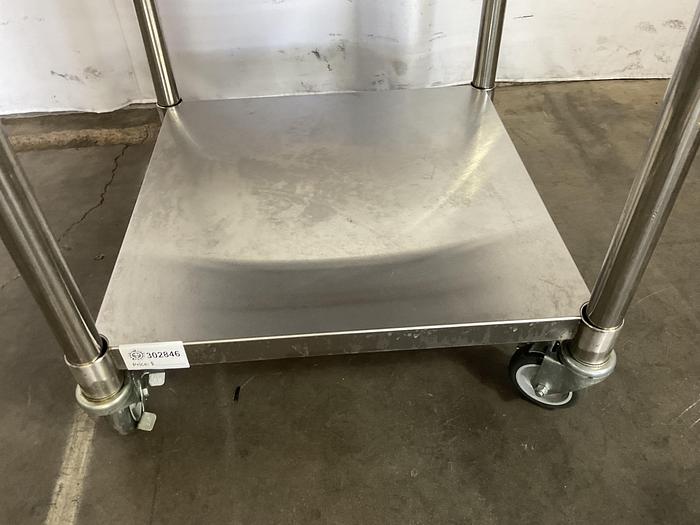 Used STAINLESS STEEL ULINE ROLLING EQUIPMENT TABLE