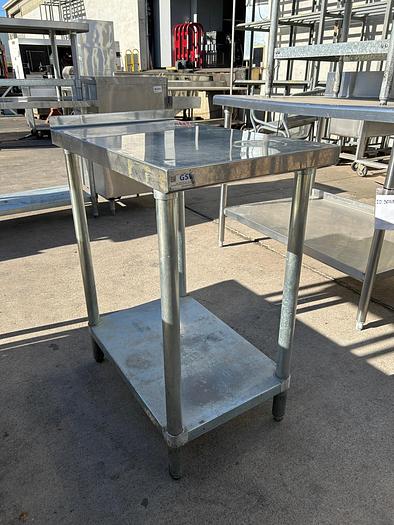 Used STAINLESS STEEL WORK TABLE./