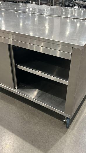 Used STAINLESS STEEL TABLE WITH SLIDING DOORS