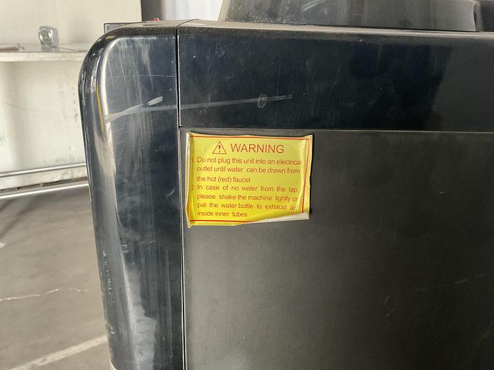 Used PRIMO HOT AND COLD WATER DISPENSER WITH A PET STATION,  601243. !