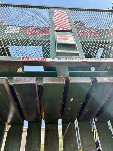 Used PHILADELPHIA TRAMRAIL CO. DOWNSTROKE VERITICAL BALER; 10HP