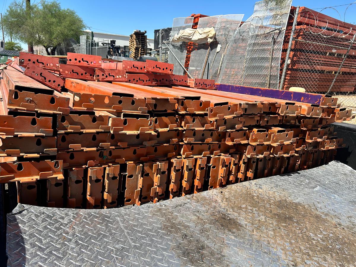 Used 12FT BY 5IN RIDG-U-RAK STYLE BEAMS