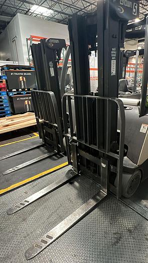 Used CROWN ACCESSES-123 STAND-UP FORKLIFT