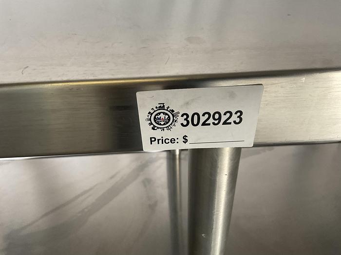 Used 72" COMMERCIAL TALBLE WITH CASTERS !