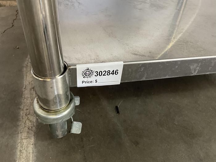 Used STAINLESS STEEL ULINE ROLLING EQUIPMENT TABLE
