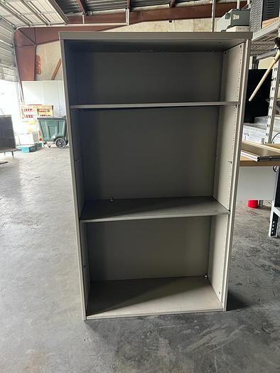 Used THREE SHELF METAL BOOKCASE ./