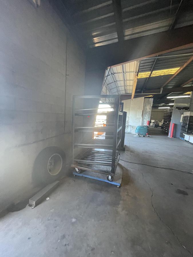 Used INDUSTRIAL BATTERY STORAGE RACK