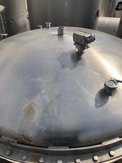 Used 1,000 Gallon Vertical Stainless Steel Tank