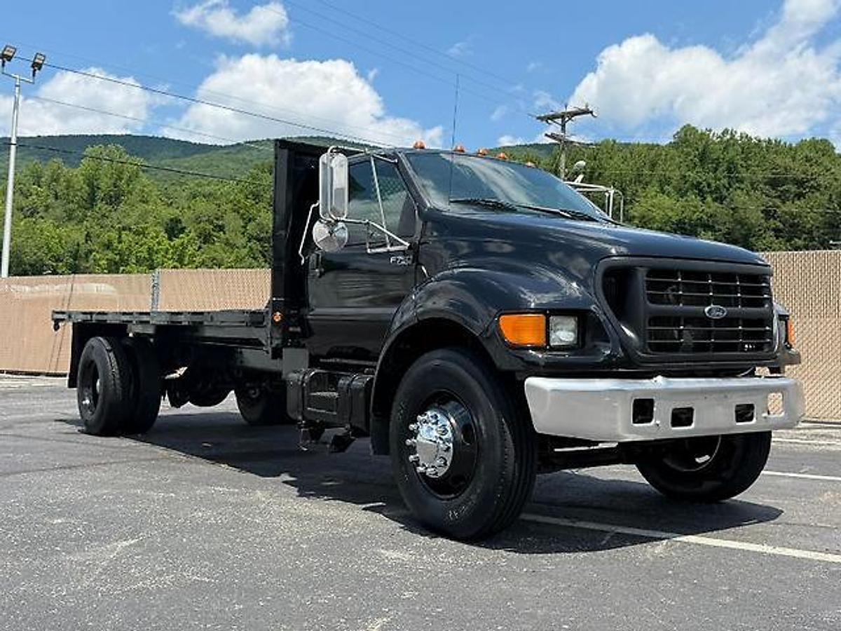 Used FORD F750 18 FT FLATBED DUMP TRUCK CATERPILLAR DIESEL 7 SPEED