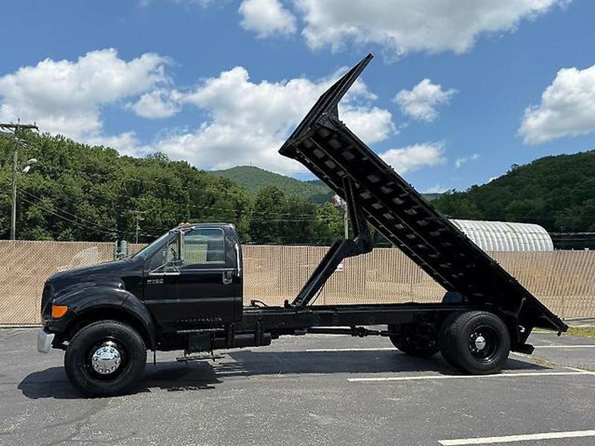 Used FORD F750 18 FT FLATBED DUMP TRUCK CATERPILLAR DIESEL 7 SPEED