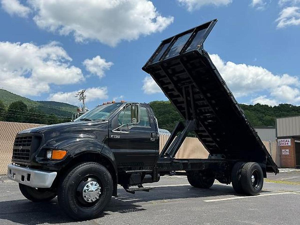 Used FORD F750 18 FT FLATBED DUMP TRUCK CATERPILLAR DIESEL 7 SPEED