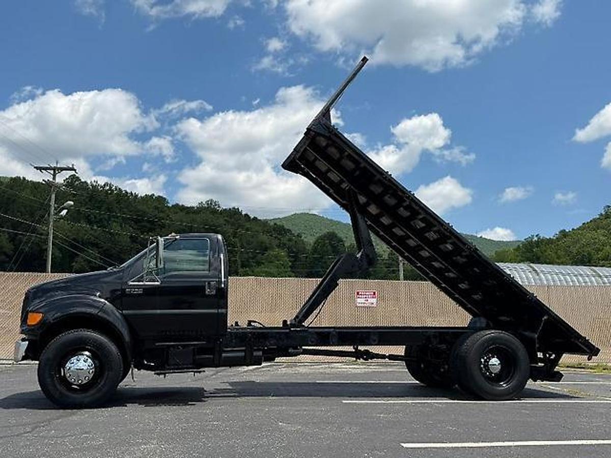 Used FORD F750 18 FT FLATBED DUMP TRUCK CATERPILLAR DIESEL 7 SPEED