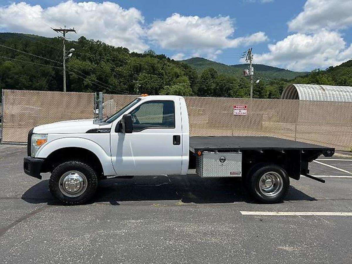 Used FORD F350 4X4 DUALLY 9 FT FLATBED TRUCK