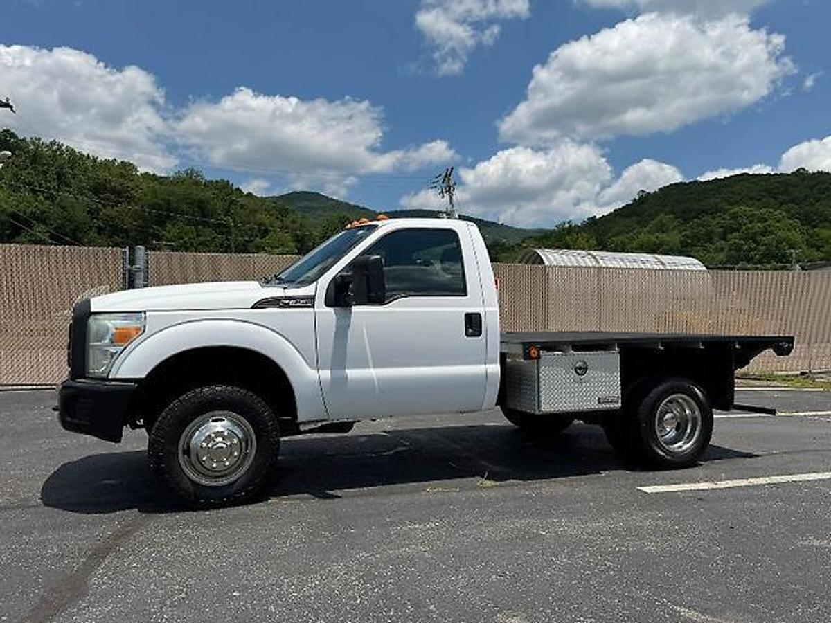 Used FORD F350 4X4 DUALLY 9 FT FLATBED TRUCK