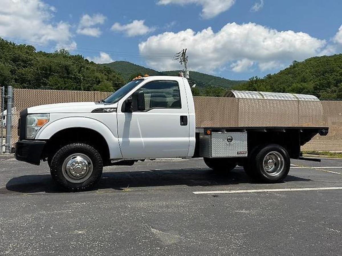 Used FORD F350 4X4 DUALLY 9 FT FLATBED TRUCK