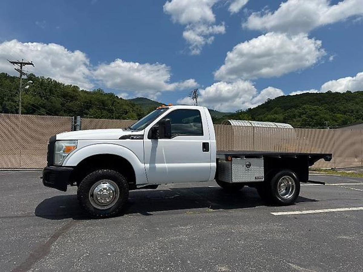 Used FORD F350 4X4 DUALLY 9 FT FLATBED TRUCK