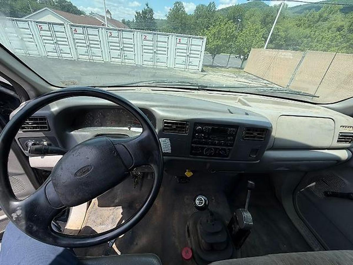 Used FORD F750 18 FT FLATBED DUMP TRUCK CATERPILLAR DIESEL 7 SPEED