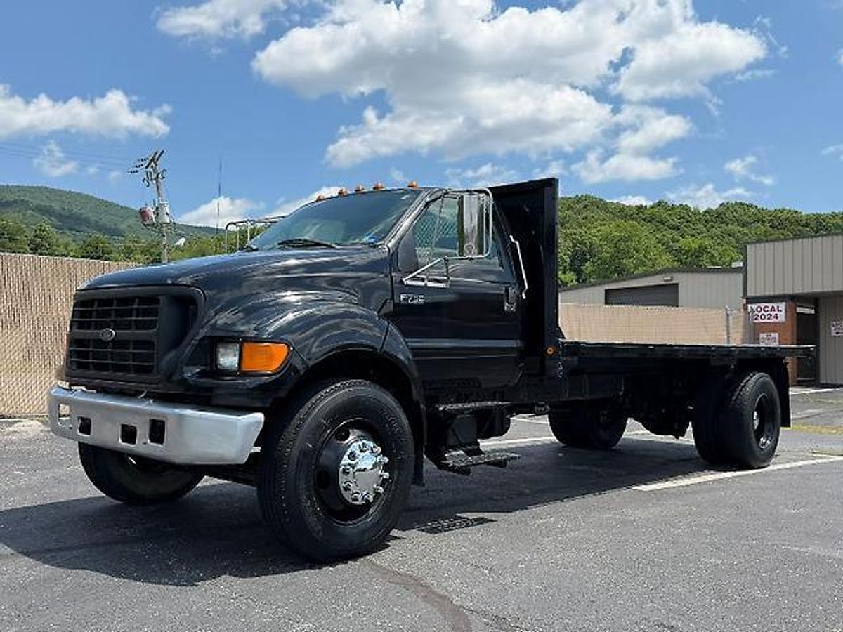 Used FORD F750 18 FT FLATBED DUMP TRUCK CATERPILLAR DIESEL 7 SPEED