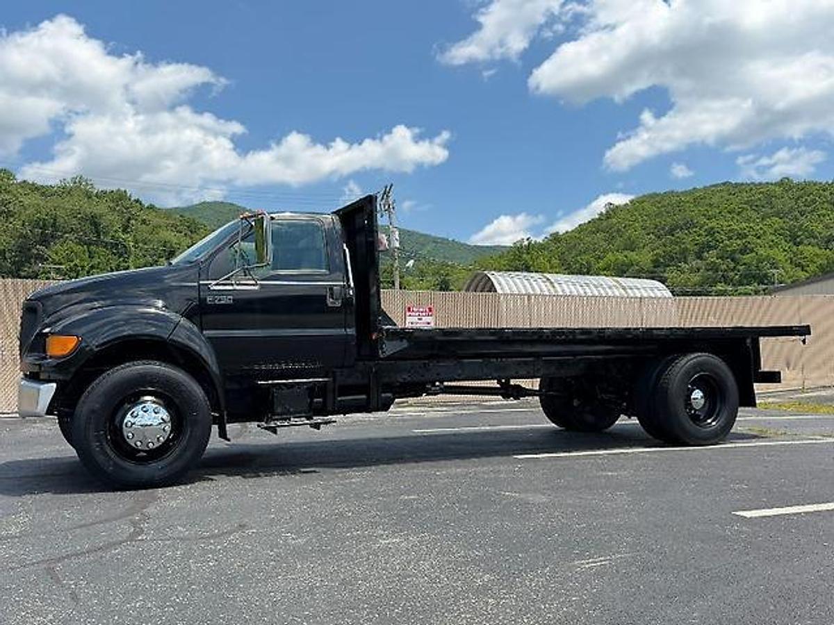 Used FORD F750 18 FT FLATBED DUMP TRUCK CATERPILLAR DIESEL 7 SPEED