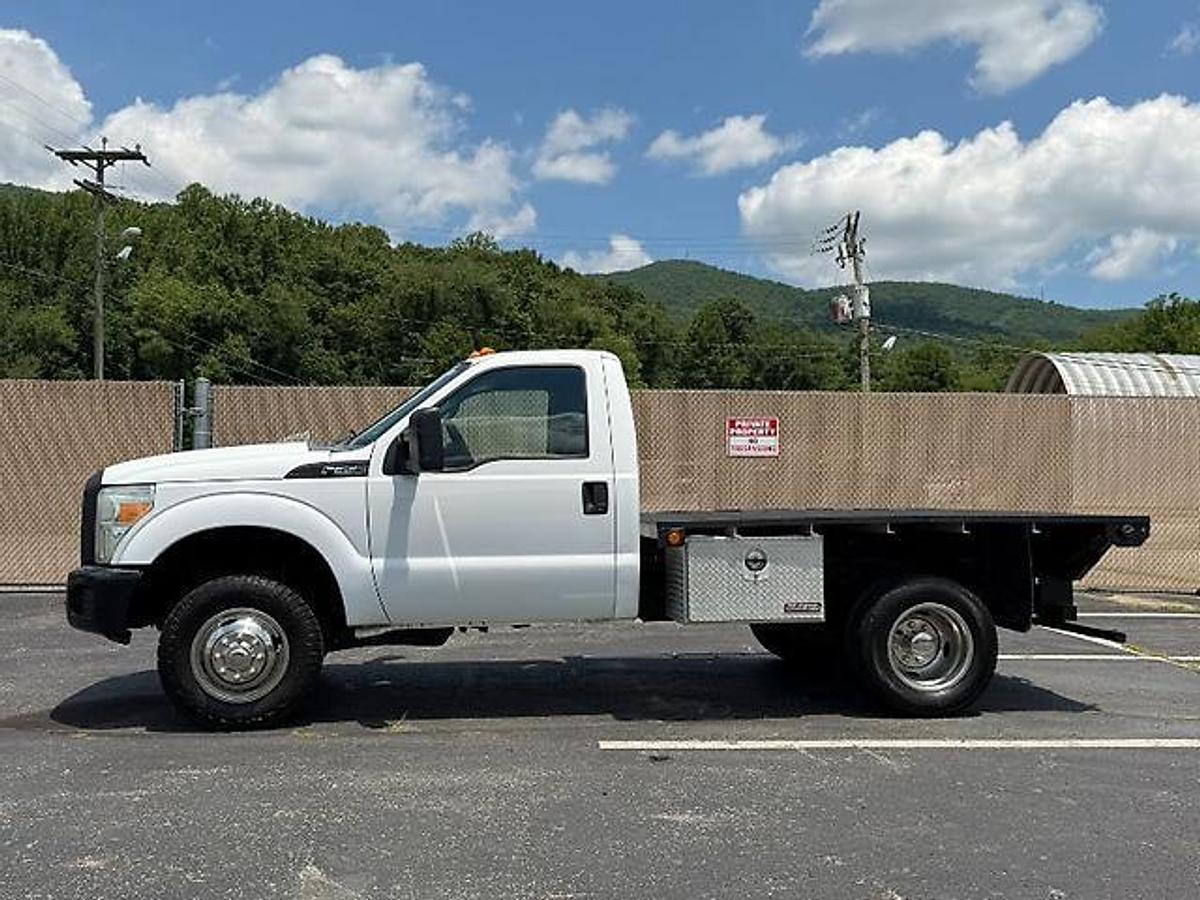 Used FORD F350 4X4 DUALLY 9 FT FLATBED TRUCK