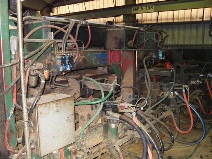 Used 4" x 24" x 20' USNR Edger Optimizer for Sale in Surrey, Canada