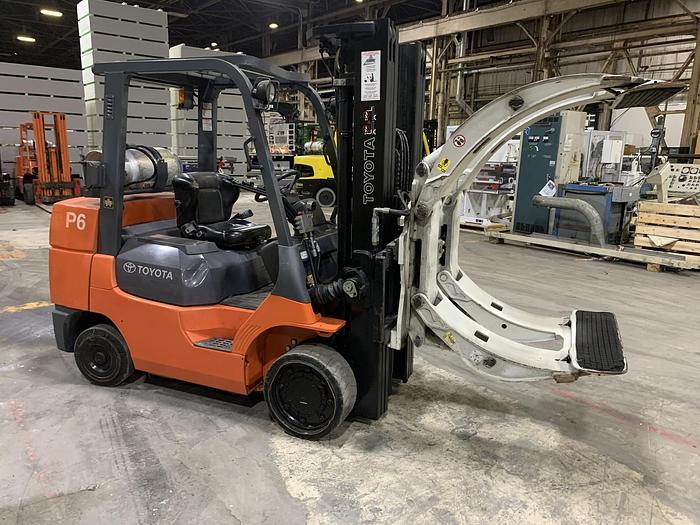 Used 8,000 POUND TOYOTA FORKLIFT MODEL 7FGCU35 WITH 63" CASCADE PAPER CLAMP