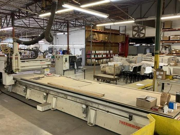 Used THERMWOOD C53DT, 3-AXIS 5 FT x 20 FT SINGLE-TABLE MOVING GANTRY STYLE 3-AXIS CNC ROUTER