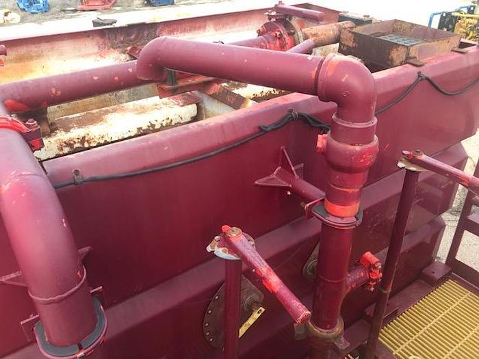 Used 2010 Stewart and Stevenson Single Pump trailer with mixing system.