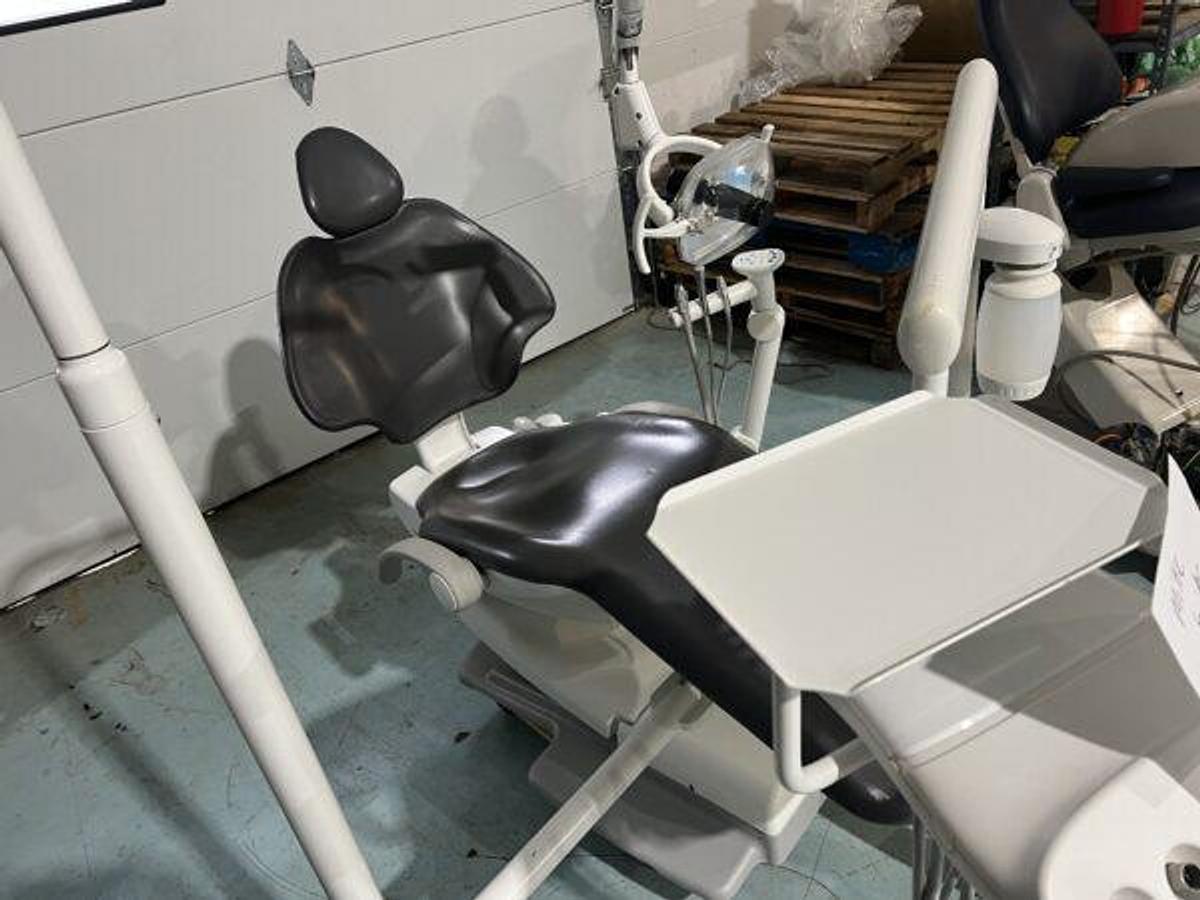 Used Adec 511 dental chair w/ radius 332 delivery system, light, and assistant package