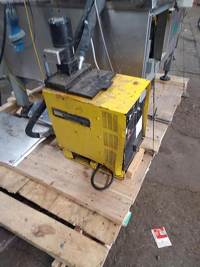 Used TRine 4500 roll fed labeler - hot melt