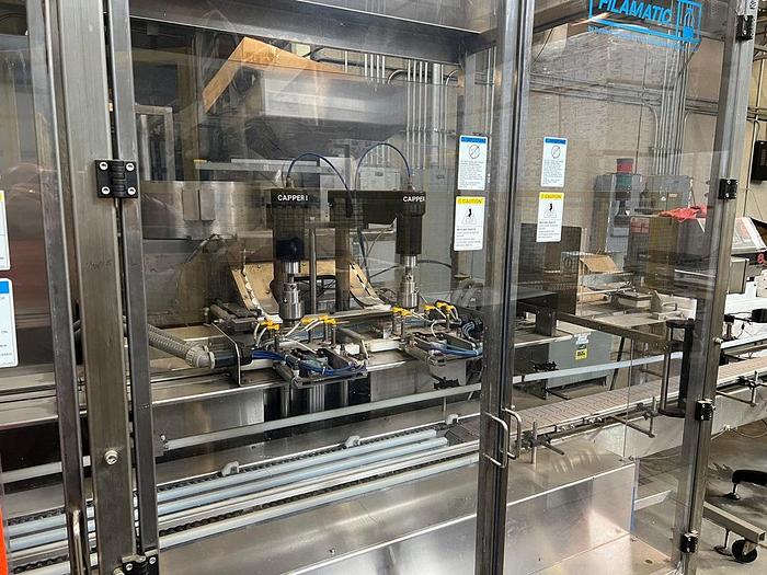 Used Filamatic 2-Head Cubitainer Filler and Capper with Conveyor