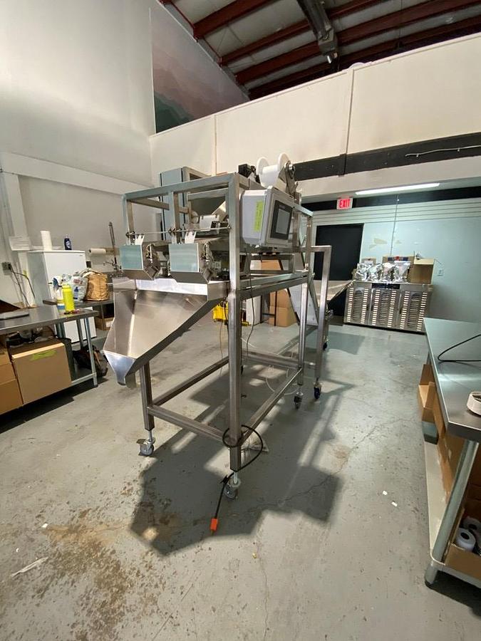 Used Filler, Weigh, Tridyne F-206, 2-Lane Net Weigh Filling System, with Conveyor, #5991637