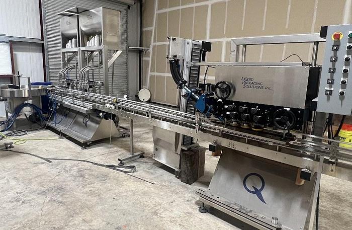 Used Filling Line, 12-Head, Overflow Filler, Inline Capper, Wrap Labeler #C745379
