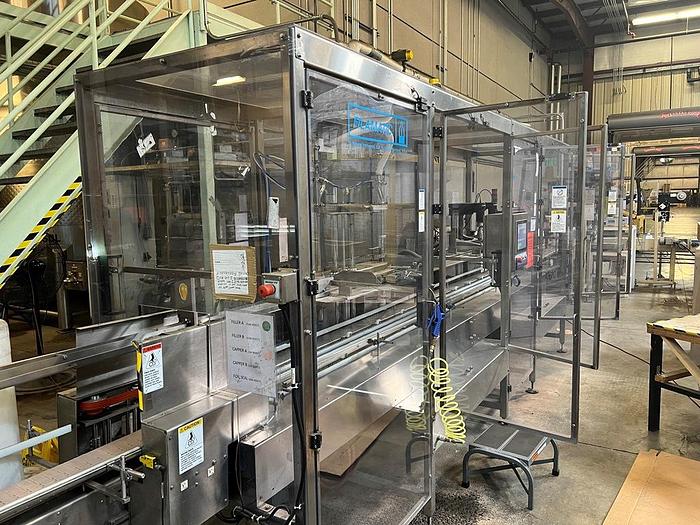 Used Filamatic 2-Head Cubitainer Filler and Capper with Conveyor