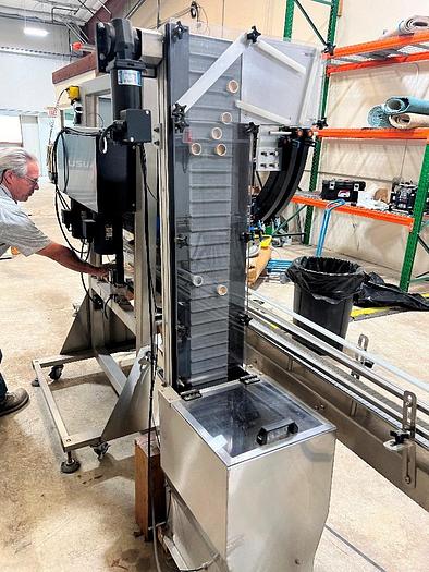 Used Filling Line, 12-Head, Overflow Filler, Inline Capper, Wrap Labeler #C745379