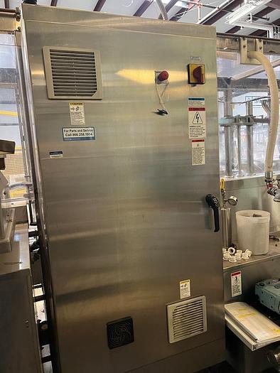 Used Filamatic 2-Head Cubitainer Filler and Capper with Conveyor