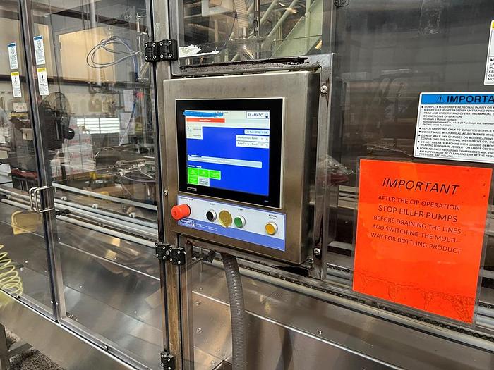 Used Filamatic 2-Head Cubitainer Filler and Capper with Conveyor