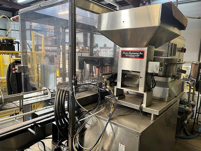 Used Filamatic 2-Head Cubitainer Filler and Capper with Conveyor