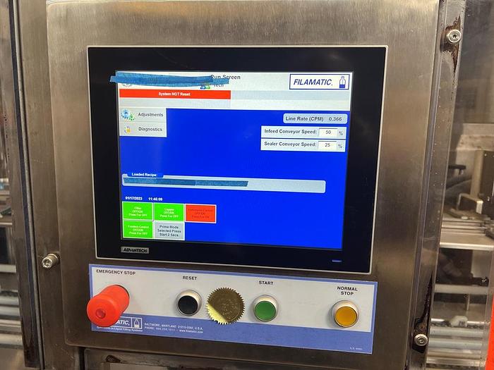 Used Filamatic 2-Head Cubitainer Filler and Capper with Conveyor