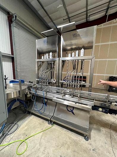 Used Filling Line, 12-Head, Overflow Filler, Inline Capper, Wrap Labeler #C745379