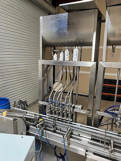 Used Filling Line, 12-Head, Overflow Filler, Inline Capper, Wrap Labeler #C745379