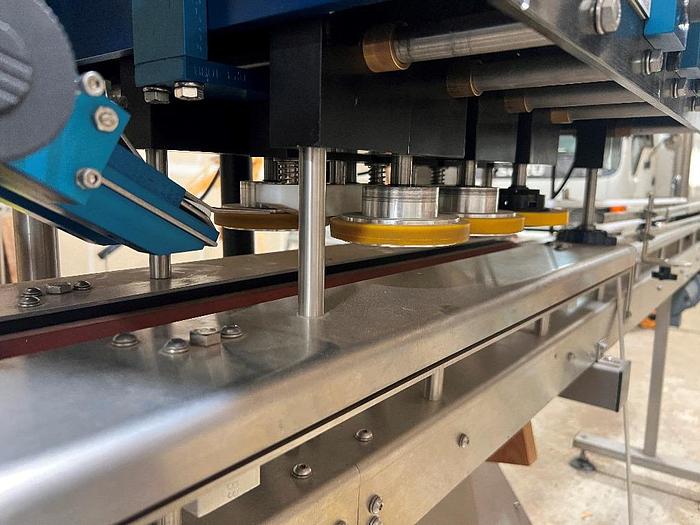 Used Filling Line, 12-Head, Overflow Filler, Inline Capper, Wrap Labeler #C745379