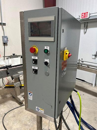 Used Filling Line, 12-Head, Overflow Filler, Inline Capper, Wrap Labeler #C745379