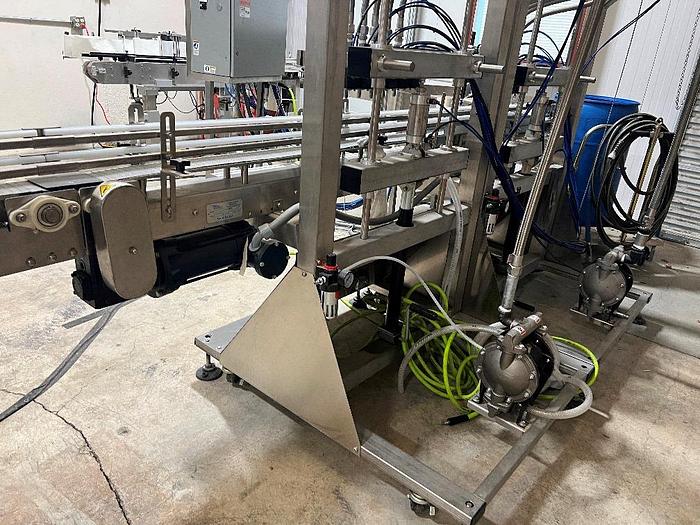Used Filling Line, 12-Head, Overflow Filler, Inline Capper, Wrap Labeler #C745379